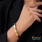 A modern gold bracelet featuring sparkling crystals for a touch of elegance. Perfect for daily wear or special occasions.