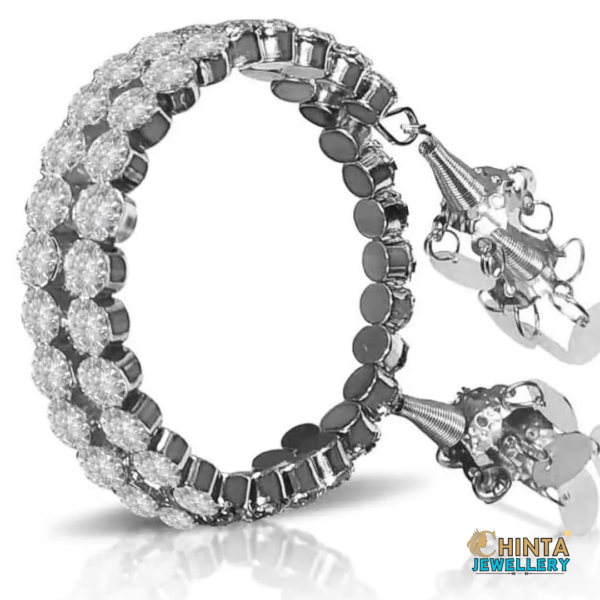 An elegant silver bracelet adorned with sparkling crystals, perfect for adding a touch of sophistication to any outfit.