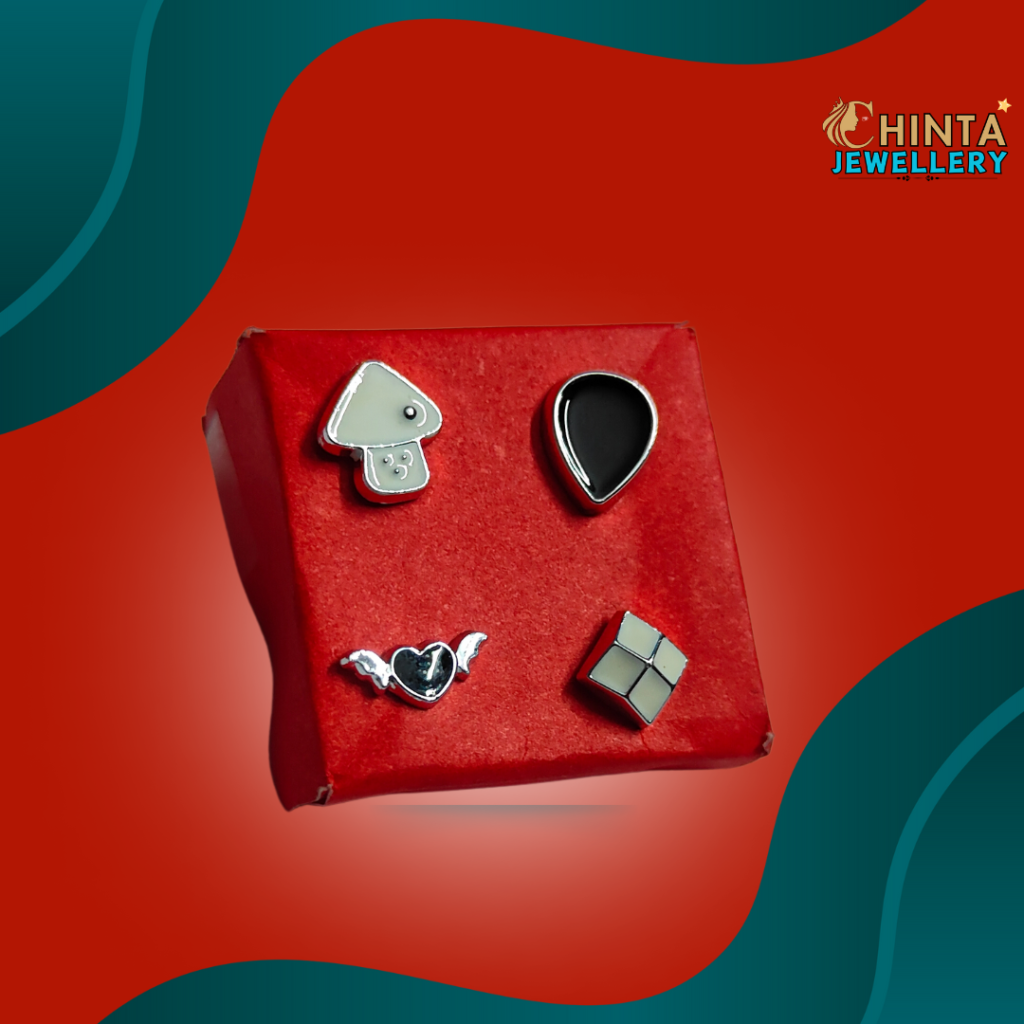 This playful set of 4 stud earrings features a mushroom, teardrop, winged heart, and geometric square. Perfect for adding a touch of whimsy to any outfit!