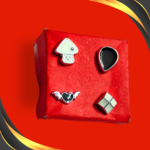 This playful set of 4 stud earrings features a mushroom, teardrop, winged heart, and geometric square. Perfect for adding a touch of whimsy to any outfit!