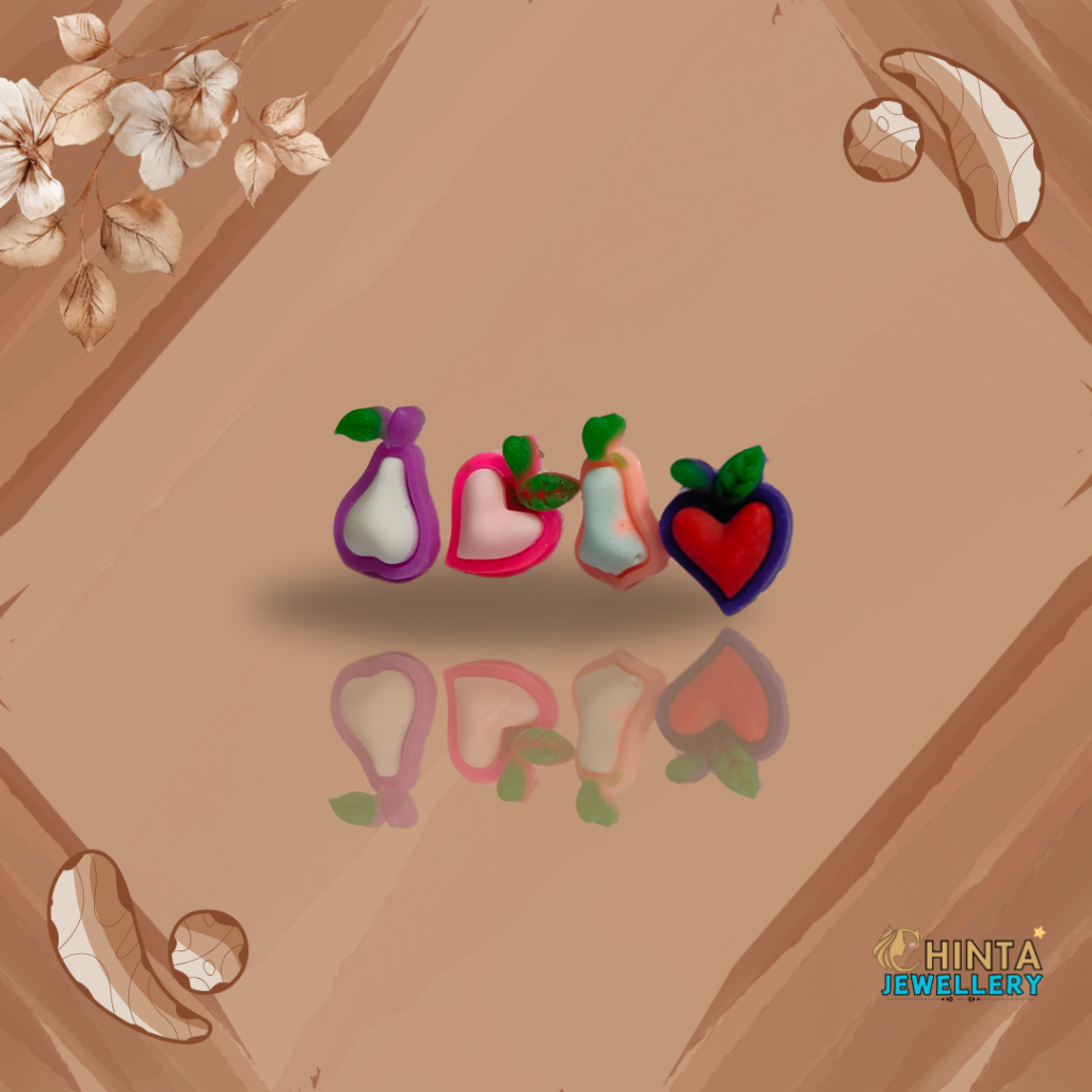 This playful set of 4 stud earrings features adorable fruit designs: a pear, a heart-shaped fruit, and two apple variations. Perfect for adding a touch of whimsy to any outfit!