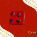 A set of 4 heart-shaped stud earrings featuring colorful designs with polka dot patterns in pink, purple, blue, and orange. Perfect for adding charm to any outfit!