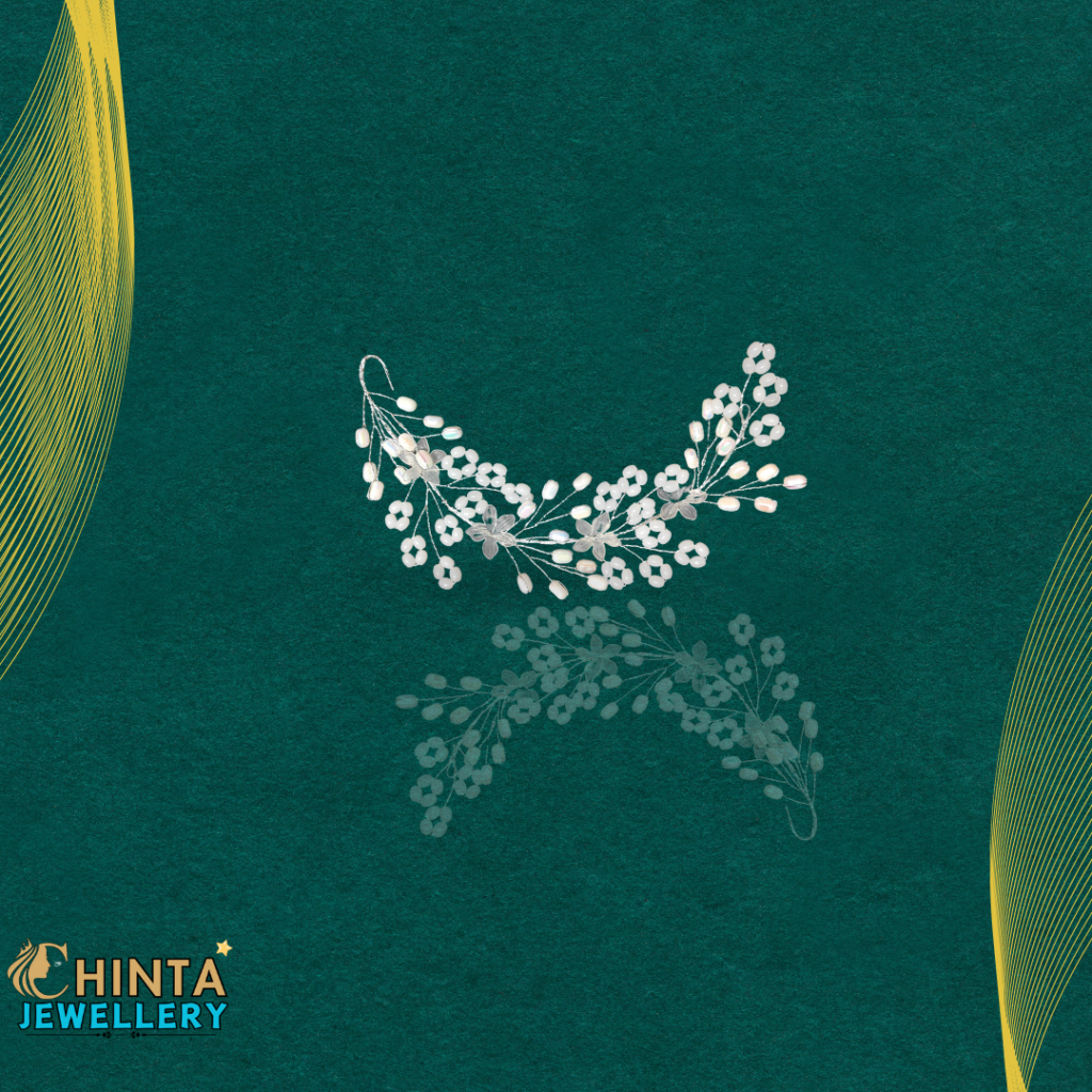 This elegant tiara features a delicate arrangement of sparkling white flowers, adding a touch of romance and sophistication to any hairstyle.