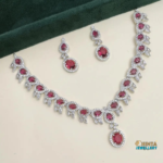 A stunning ruby and diamond necklace set featuring an intricate design, perfect for weddings, parties, and special occasions. Crafted with high-quality materials to add a touch of luxury to your ensemble.