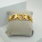 This stunning gold butterfly bracelet is a perfect blend of elegance and style