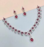 A stunning ruby and diamond necklace set featuring an intricate design, perfect for weddings, parties, and special occasions. Crafted with high-quality materials to add a touch of luxury to your ensemble.
