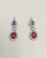 A stunning ruby and diamond necklace set featuring an intricate design, perfect for weddings, parties, and special occasions. Crafted with high-quality materials to add a touch of luxury to your ensemble.